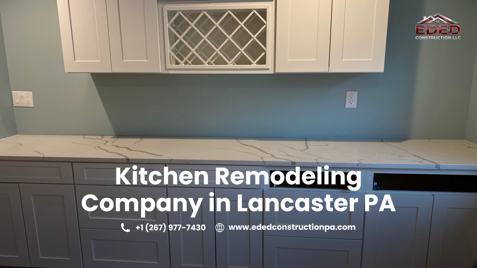 Modern kitchen remodeling project in Lancaster, Pennsylvania featuring white shaker upper cabinets, gray lower cabinets, quartz countertops with marble-style veining, built-in wine rack cabinetry, and a clean contemporary design by EDED Construction LLC.