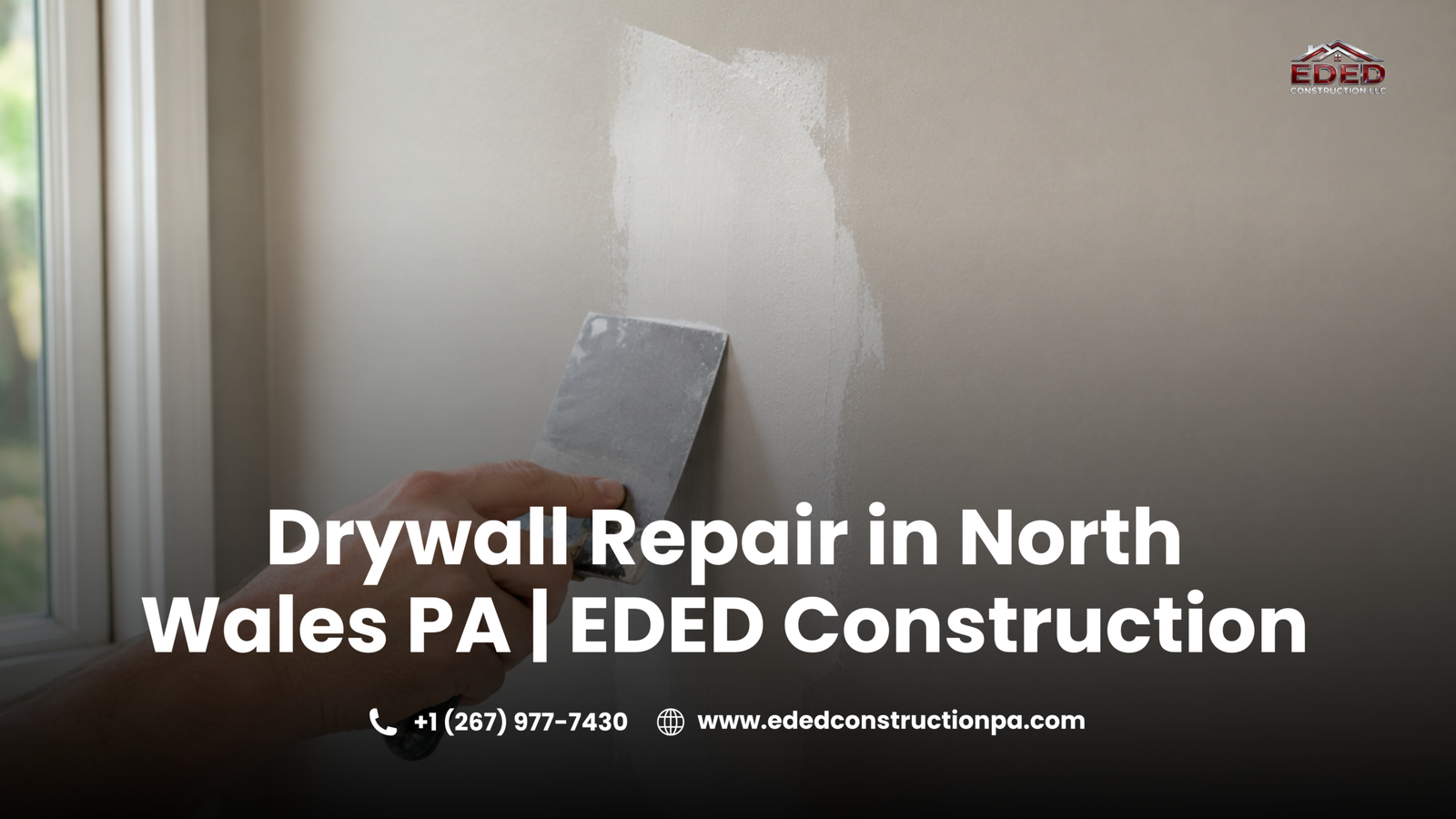 Close-up of a professional drywall repair on a painted interior wall, with a contractor applying joint compound over a patched area using a putty knife to create a smooth, seamless finish before final sanding and repainting.